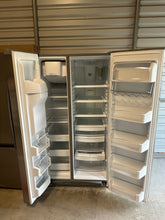 Load image into Gallery viewer, A GE Profile Refrigerator
