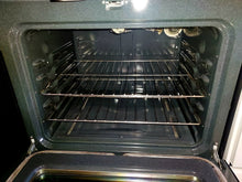 Load image into Gallery viewer, GE Black &amp; Stainless Steel $399.00
